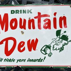 Mountain Dew porcelin sign 12 inches by 9 inches