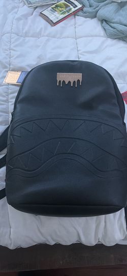 Spray ground backpack