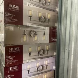 Evelyn 26.75 in. 3-Light Brushed Nickel Vanity Light with Clear Glass Shades