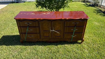 Large wooden dresser with two night stands