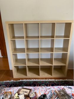 Blonde bookcase shelving