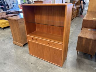Vintage Danish Modern Teak Drop Front Locking Bar Cabinet with Glass Shelf and Bone Shaped Finger Pulls