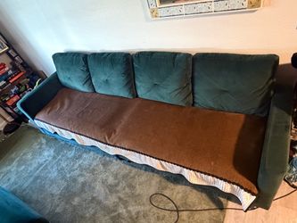 Dark green couch with storage ottoman and 2 chaises