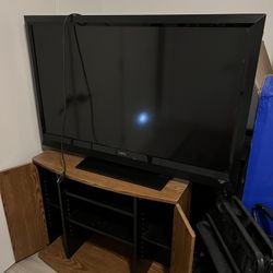 47 inch TV and Entertainment center