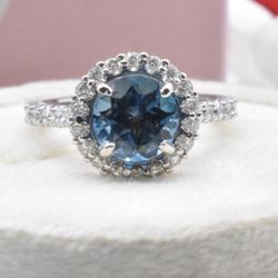 Custom made London blue topaz/diamond ring (OBO)