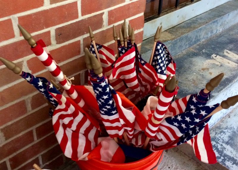 American flags and eagle statues handmade