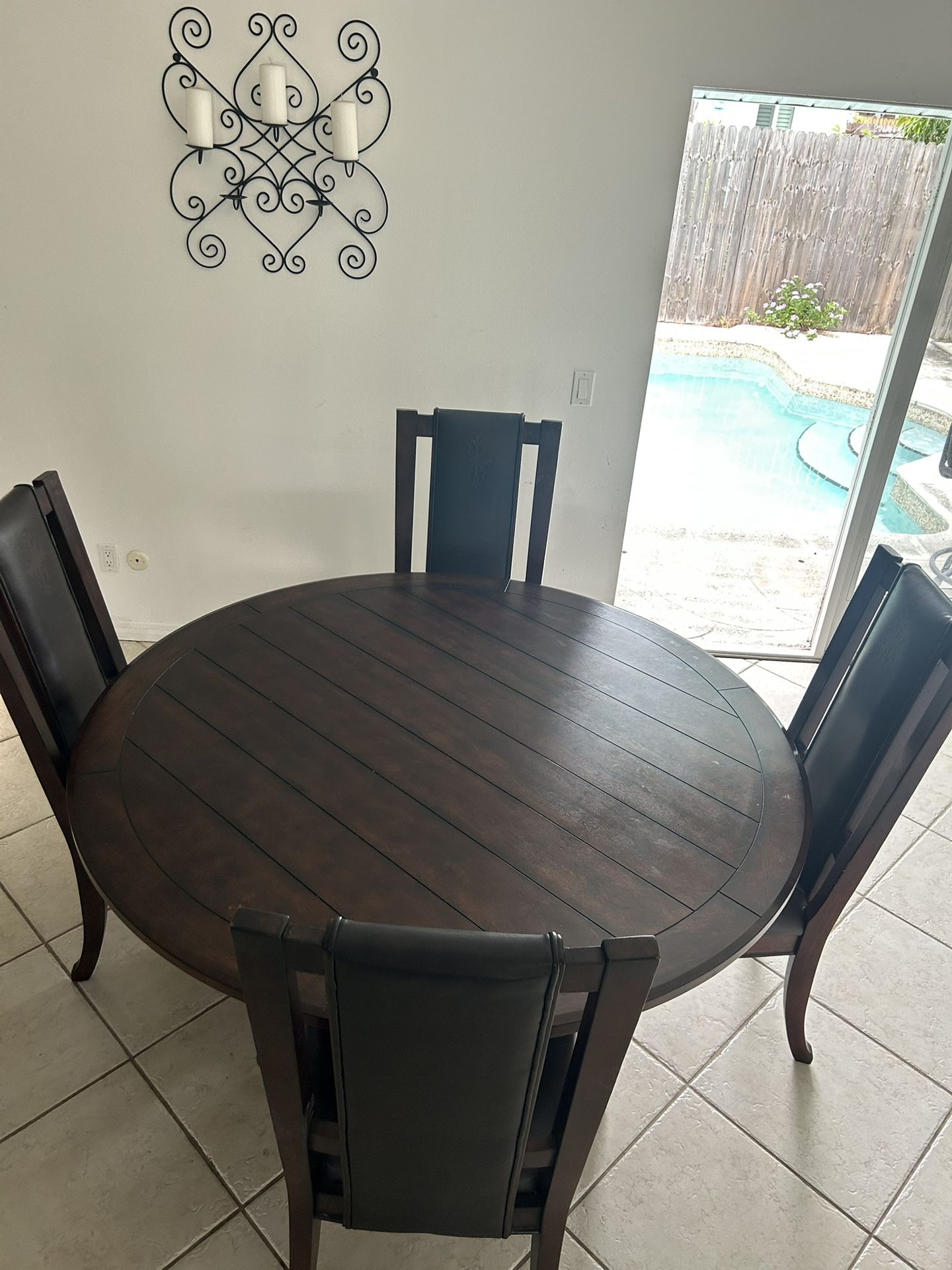 Round dining Table 60” And 4 Chairs  (Ashley )