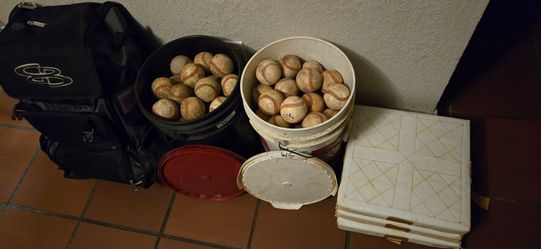 Baseballs, bases, baseball backpack