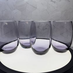 Set of (4) Amethyst stemless wine glasses or tumblers are designed with a unique stemless shape, perfect for both casual and formal occasions. Used co