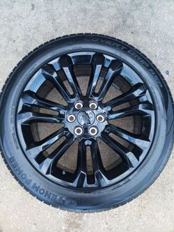 Set (4) of 22" Chevrolet Gloss Black Wheels w/ locking black lugs with 285/45/22XL Venom Power Tires