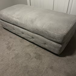 Ottoman or bench for foot of bed. 