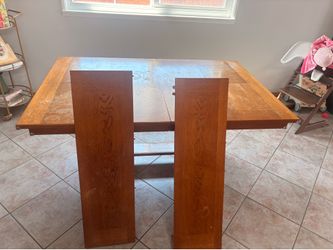 64”x42”x 30” Wooden Table with two 12” extender leaves