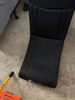 black mesh X Rocker floor gaming chair