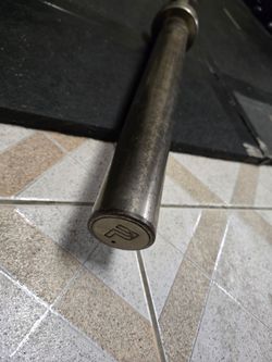 Older 45lb 7ft Power Systems Olympic Weightlifting (Bearing) Bar