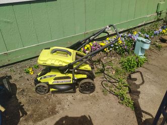The RYOBI 13 in. 11 Amp Corded Electric Walk Behind Push Lawn Mower is a powerful and convenient lawn care tool. With a cutting width of 13 inches and