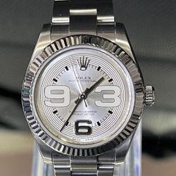 Rolex Oyster Perpetual 31 Silver Dial Gold & Steel Watch 177234