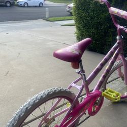 pink “huffy” bike (5-10 yr old)