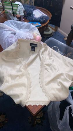 Size large cream colored shrug