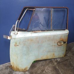 Vw split window bus drivers door original 
64-66 comes with glass and mirror as pictured slight rust on the bottom $250
