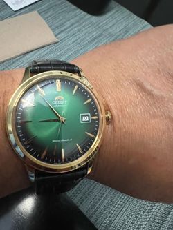 Orient Bambino 2 generation. Men’s watch, 41.5mm, from left to right.