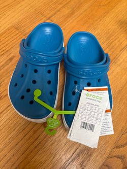 Brand new crocs for kid size m4/w6