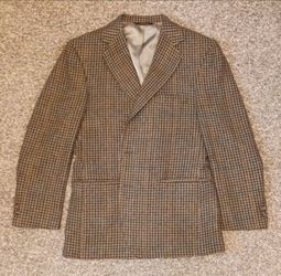 Brown wool suit jacket in Great Condition. Clean and ready to use.