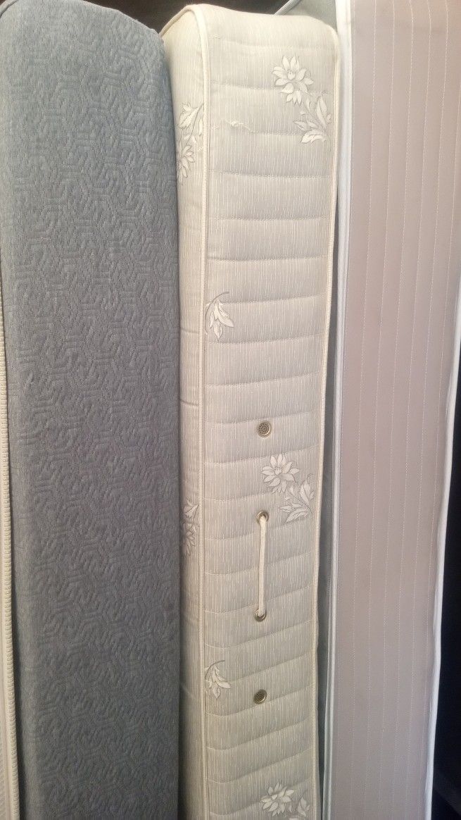 Three Twin Mattresses And One Twin Box Spring 