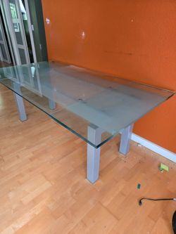Dining room table solid glass