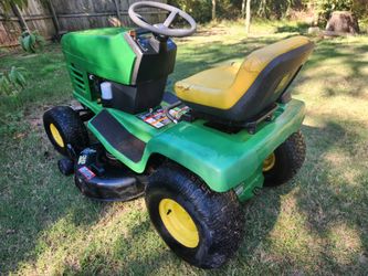 John Deere Riding Lawn Mower. Delivery Available.