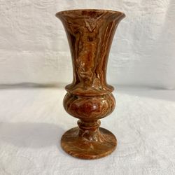 Onyx Flower Vase reds browns grays intricate graining.