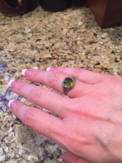 Sterling silver and peridot ring w/filigree- approx size 6