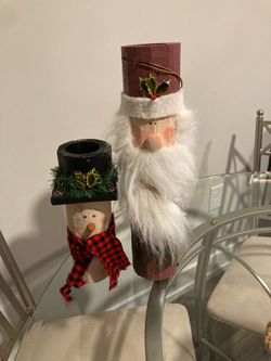 Wooden pillar snowman and Santa