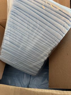 BOX OF DOG TRAINING PADS