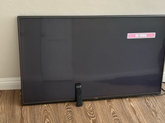 LG 49 in television  with remote