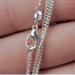 20" Solid Sterling Silver Stamped Unisex Curb Necklace / Chain 

Brand New 

High Polish 

2mm Thickness 

Offers Welcome 

Looks Great With a Pendant