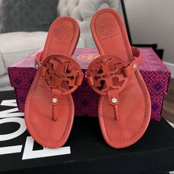 TORY BURCH Miller flip flops size 7 in Tiger Lily color (orange)