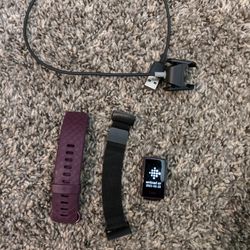 Fitbit Charge 4 with Charger and Bands (READ)