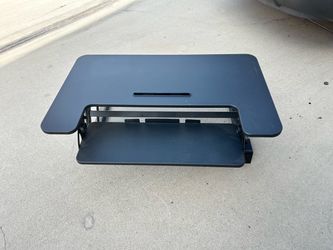 appears to be a VIVO 36" Height Adjustable Standing Desk Converter