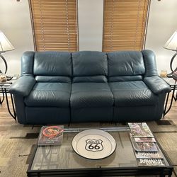 88 “ LEATHER SOFA WITH BILT IN RECLINERS