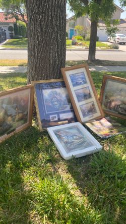 Thomas Kincaid’s painting book plaque