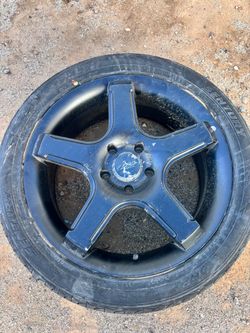Black 5-Spoke Alloy Wheel with Century Tire
