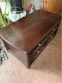 Coffee table with lift top
