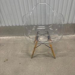Lucite shell chair… 27” high , 24” depth , 25” wide . $50