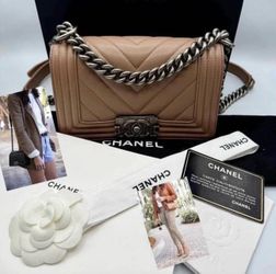 Authentic  Chanel Caviar Quilted Boy check more pictures