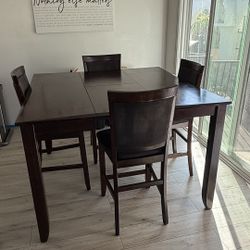 Expandable Bar Height Dining Table With 4 Chairs and Center Leaf