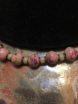 Pink beads with floral print