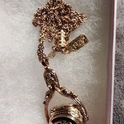 1928 3 Sided Spinning Locket