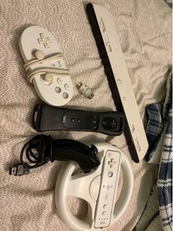 Nintendo Wii U Console with Wii Remote, Classic Controller, and Racing Wheel