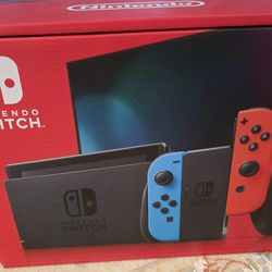Nintendo Switch with Neon Blue and Neon Red Joy-Con