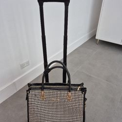 Gorgeous Travel Carry-On~ on wheels.Purchased in Switzerland 